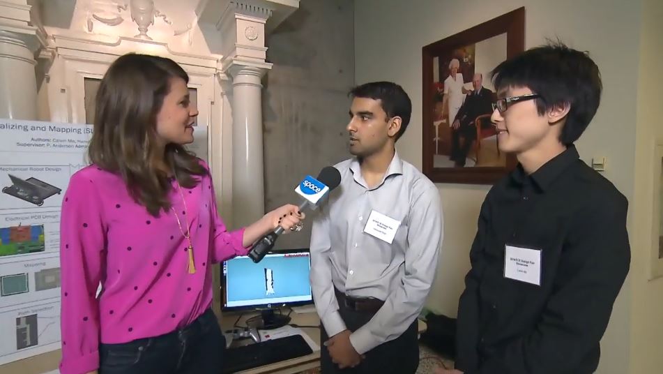 Morgan Hoffman of the Space Channel show InnerSpace interviews Harsoveet Singh (left) and Calvin Ma about their project, SLAM.
