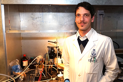 Dr. Illan Kramer and the sprayLD setup he designed to spray solar cells onto flexible surfaces.