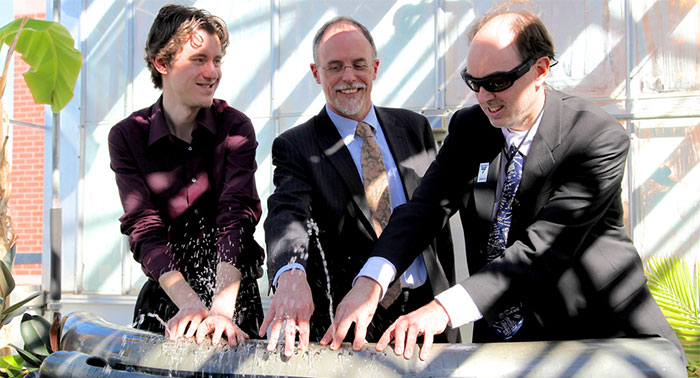 Janzen, Bell and Mann play the hydraulophone.