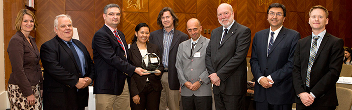 Co-inventors Milos Popovic, Santa Huerta Olivares, Peter Lehn and Aleksandar Prodić accept their group award. Massimo Tarulli could</br> not attend as he is currently pursuing a medical degree at Dartmouth College in New Hampshire.