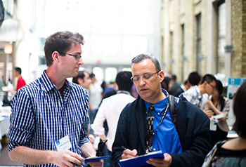 Judges evaluate design projects at ICUE 2013. Image credit: William Ye.