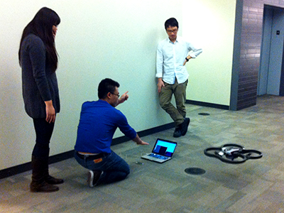 Haeri Kim, Ray Ding and Tony Zhang, aka "Team Goose", demonstrate their gesture-controlled quadcopter Friday, Nov. 29, 2013.