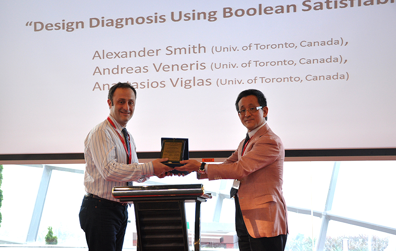Professor Andreas Veneris receives his award at ASP-DAC 2014 in Singapore.