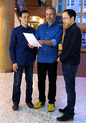 Brendan Frey (centre) pictured with first co-authors Leo Lee and Hui Xiong (Photo: Jessica Wilson).