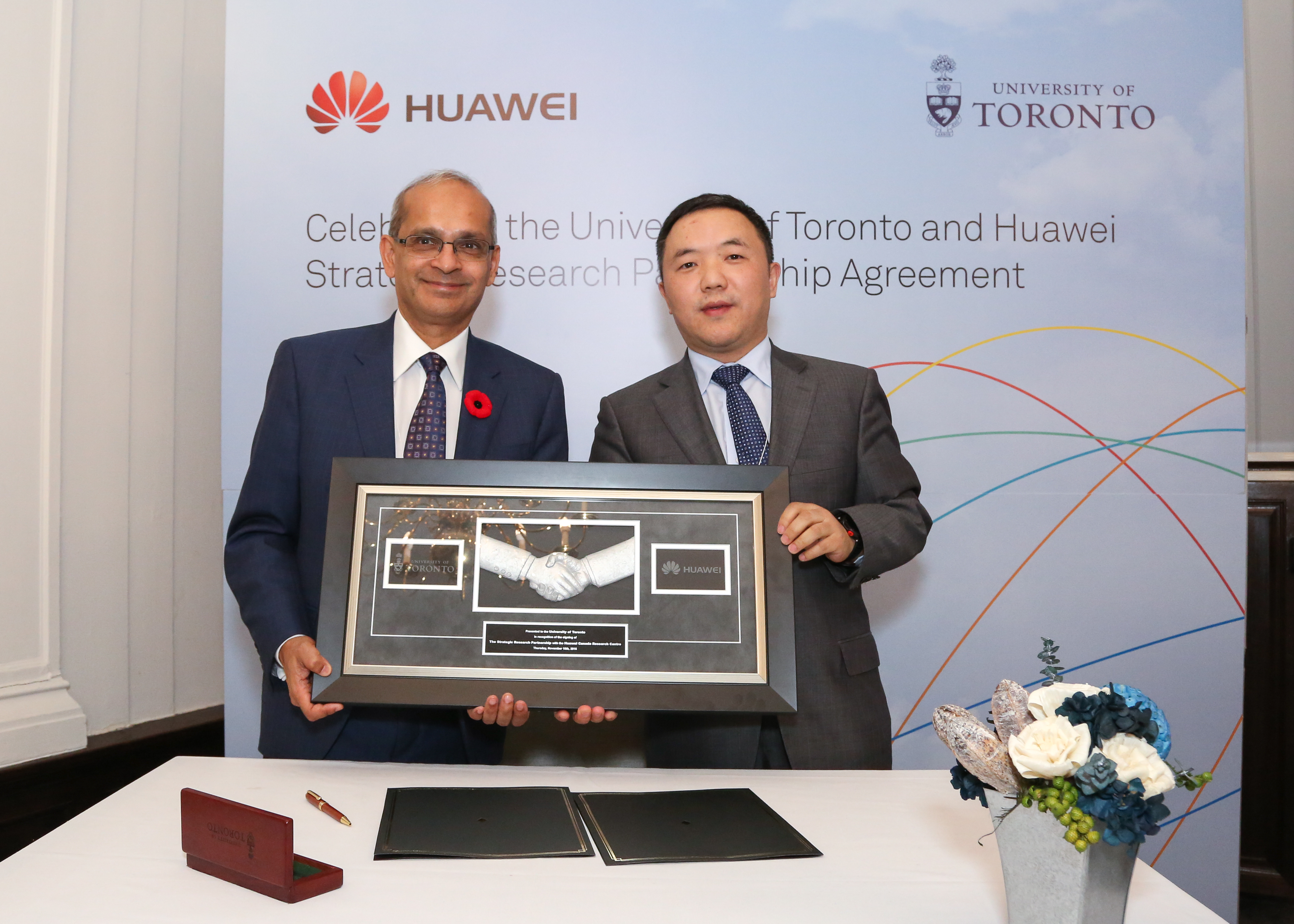 Professor Vivek Goel (left), vice president, research and innovation for the University of Toronto, and Jun Zha, president of Huawei’s Central Research Institute,