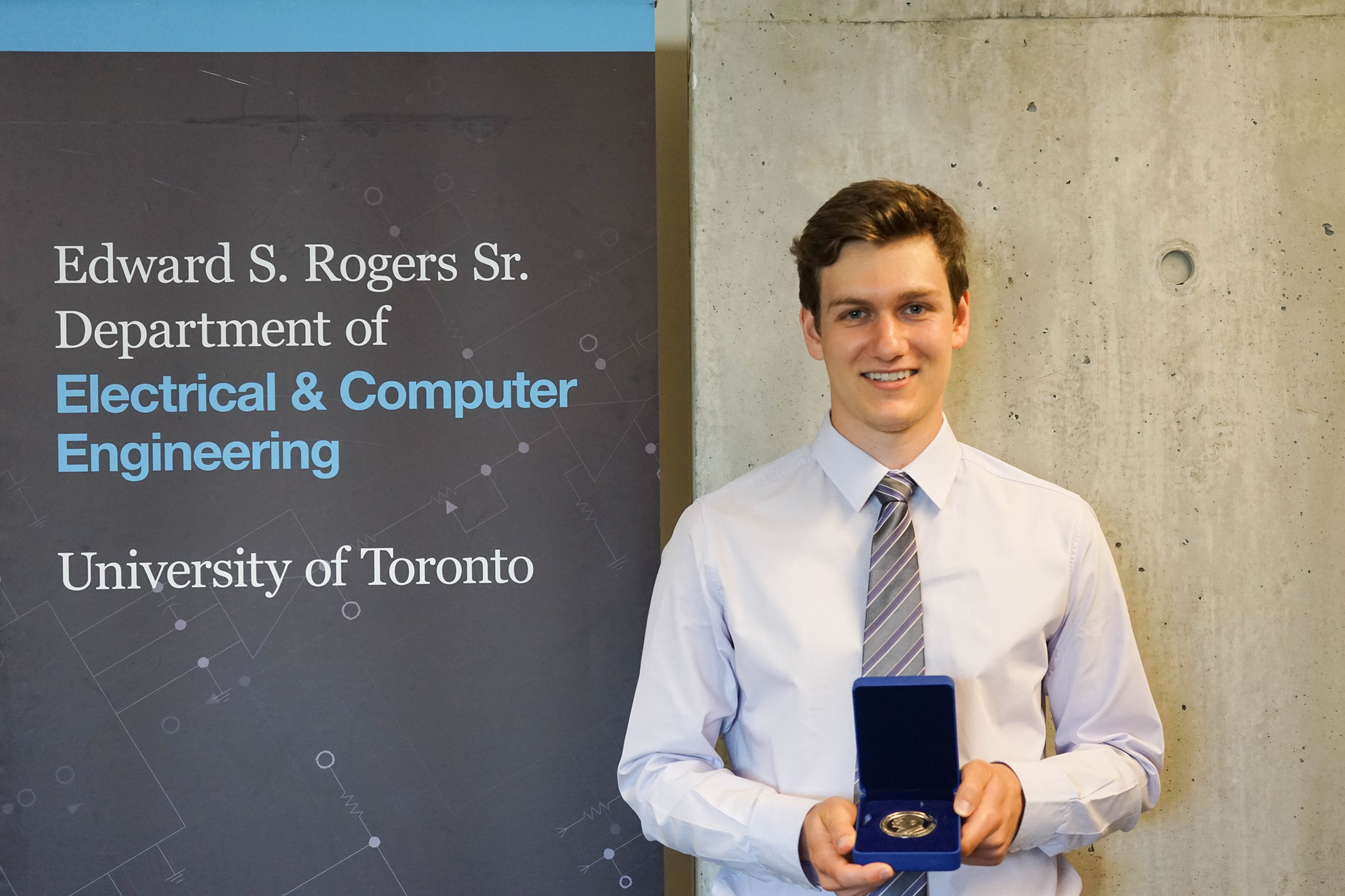 Sandro Young (CompE 1T6+PEY) displays his Governor General's Silver Medal.