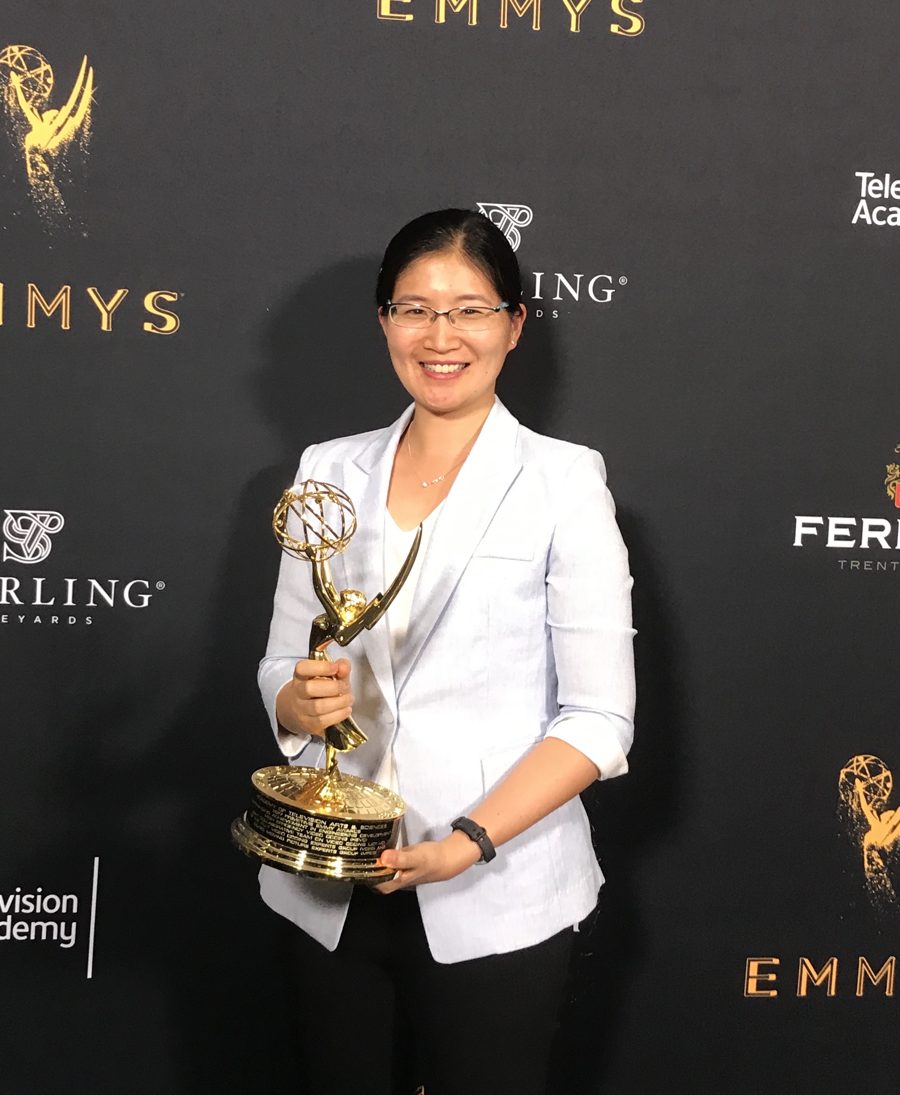 Professor Vivienne Sze (ElecE 0T4) holds the Emmy her team won at the Engineering Emmy Awards (Photo: Minhua Zhou)