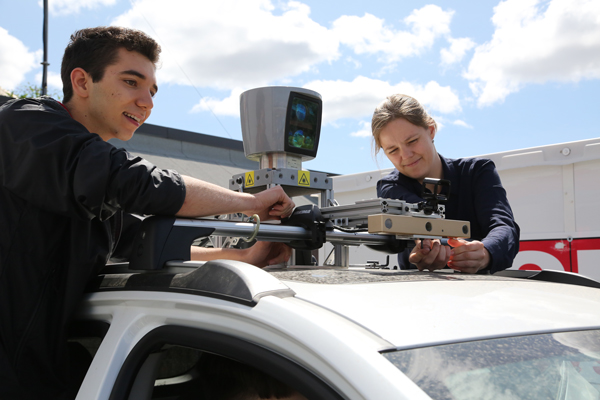 Robert Adragna and Mona Gridseth work on a sensor array.