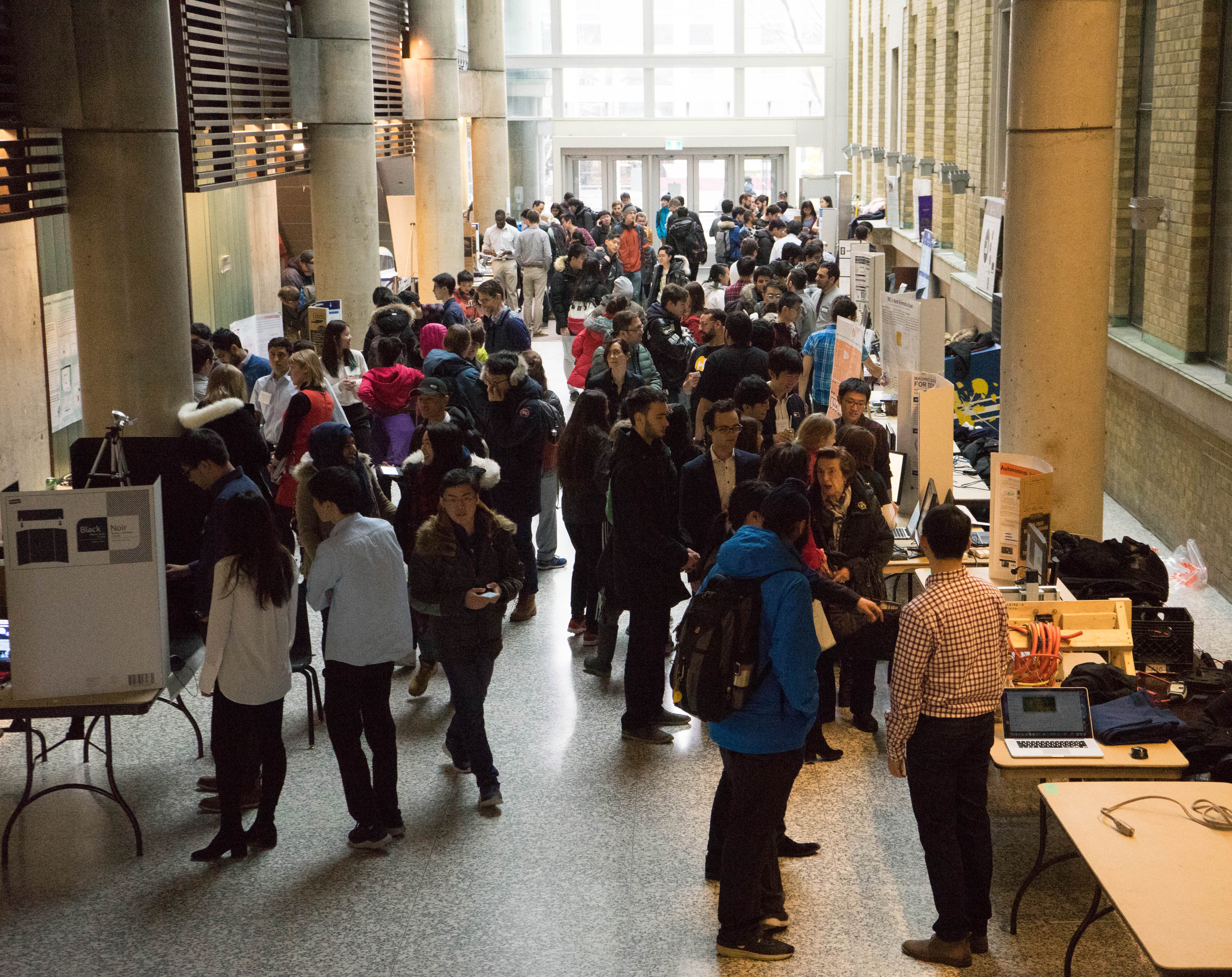 Groups of students display their projects to the public in the Bahen Centre.