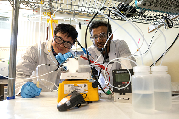 Dr. Cao-Thang Dinh, left, and Dr. Md Golam Kibria demonstrate their new catalyst
