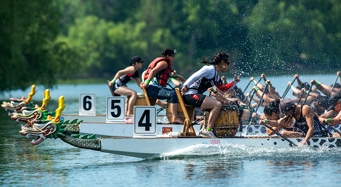 Drummers on the end of a dragon boat