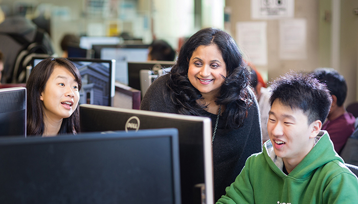 Professor Deepa Kundur (ECE, at centre) is one of 11 U of T Engineering researchers receiving investment from NSERC’s Strategic Partnership Grants program. Strategic Project Grants support researchers working alongside policy makers and Canadian companies to generate new technology. (Credit: Neil Ta)