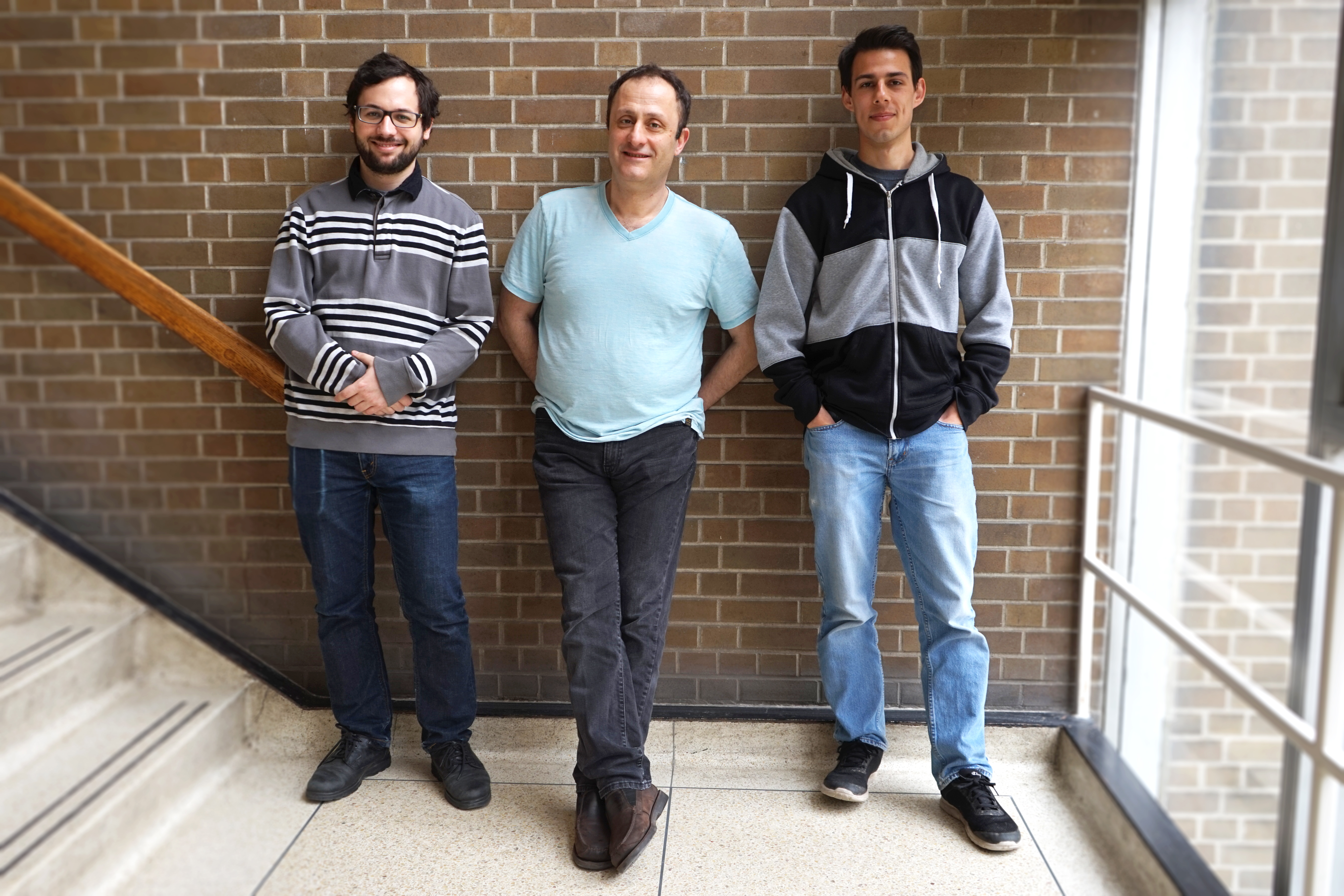 Professor Andreas Veneris (centre) and graduate students Ryan Berryhill (left) and Neil Veira (right) are part of a multidisciplinary group working on blockchain research at the University of Toronto.