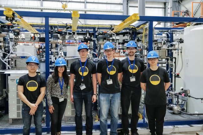 Members of CERT Systems, Inc. with their pilot unit at Zeton Engineering in Burlington, ON. This week, the team was awarded funding from Natural Resources Canada’s Breakthrough Energy Systems Canada competition to advance their carbon-recycling technology. (Photo courtesy CERT Systems Inc.)