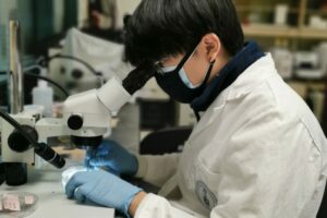 Graduate research assistant Weiwu Chen (CivMin) in lab