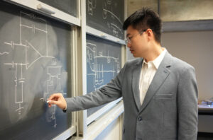 Professor Xilin Liu at chalkboard