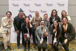 Students with silly glasses in a group shot