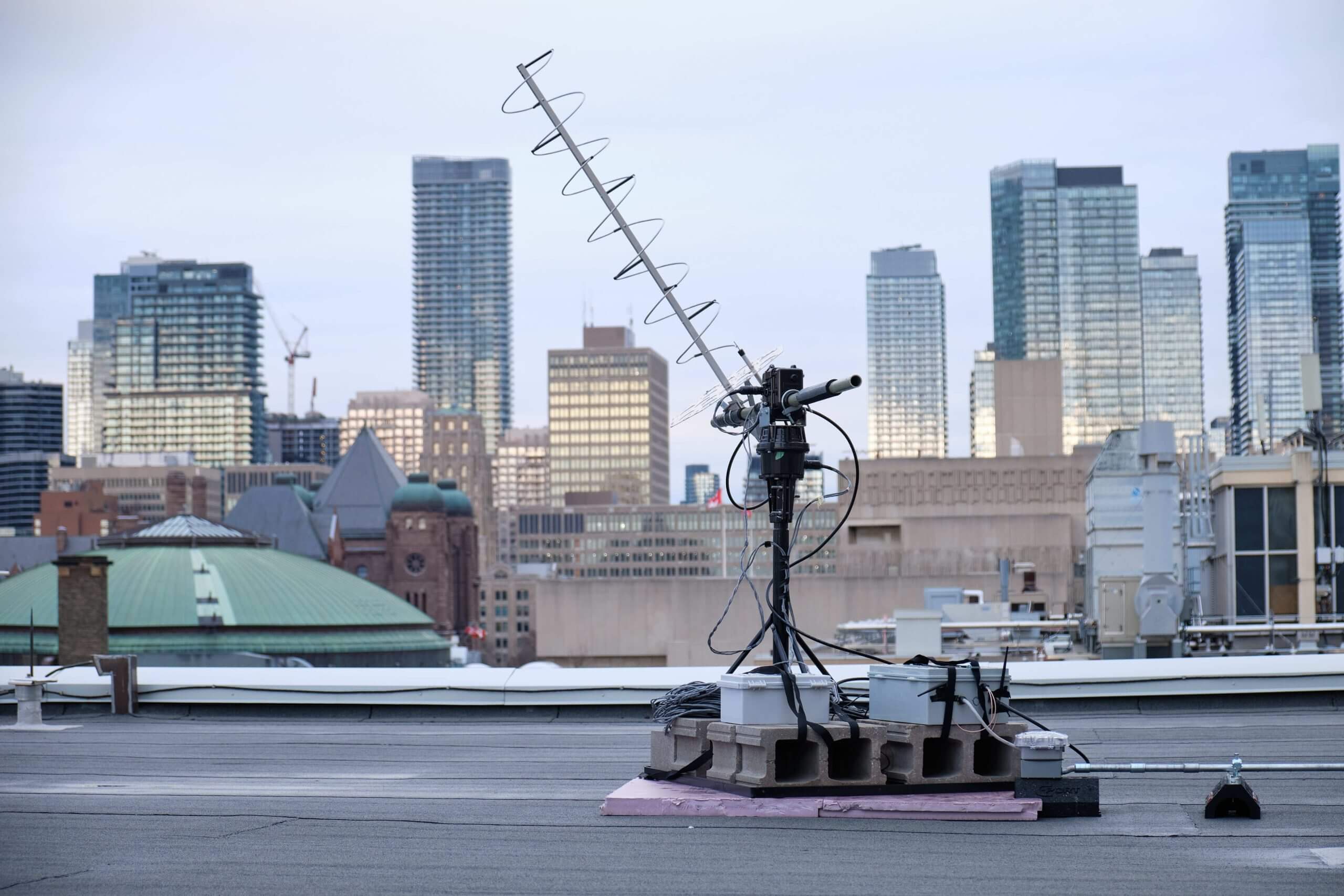Equipment on roof with skyline in background